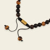 Obsidian Might Necklace with dark beads and a cross pendant