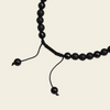 Obsidian Might Necklace with dark beads and a cross pendant