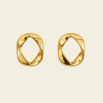 Open Form Earrings with open asymmetric geometric stud shapes in gold finish
