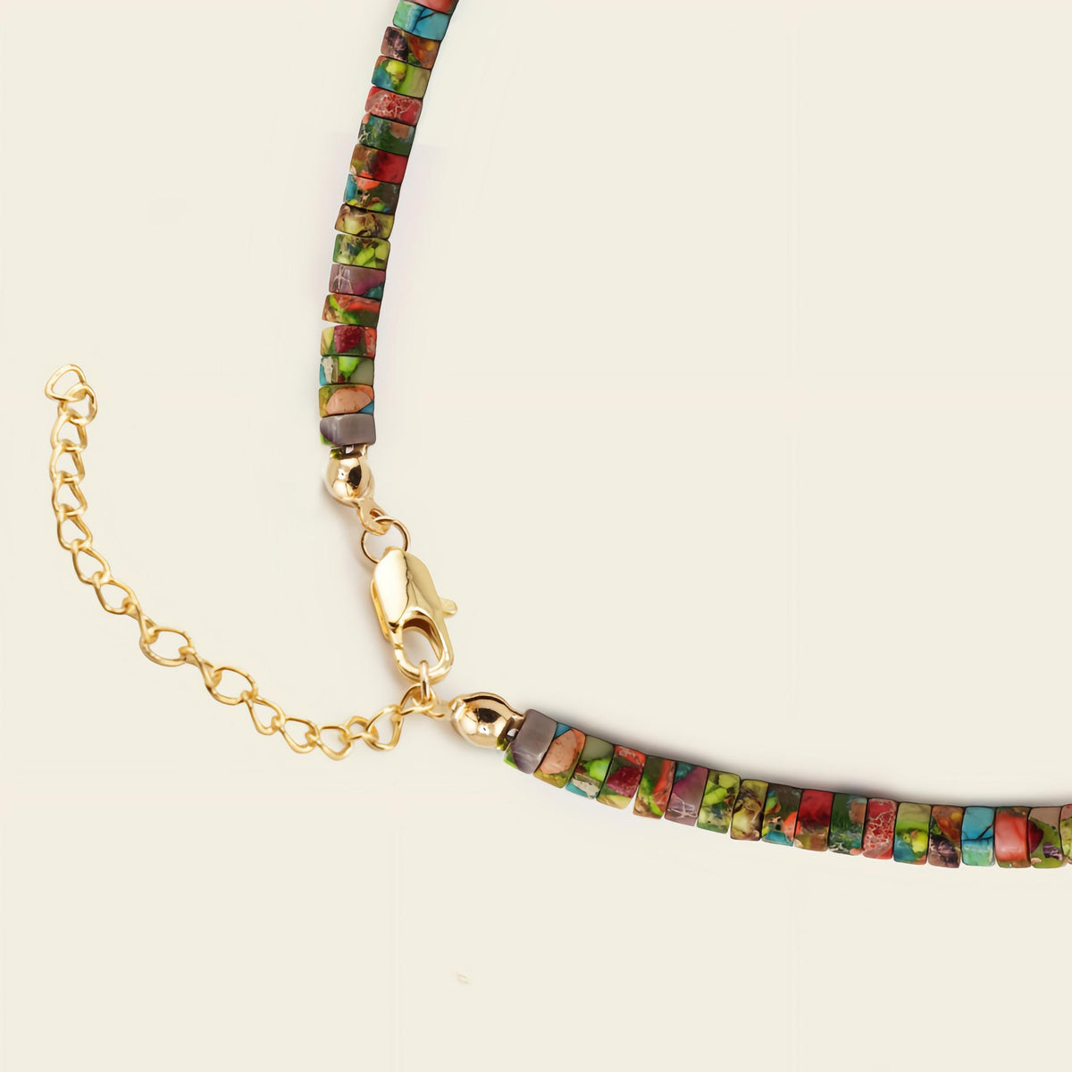 Painted Terrain Necklace with a short strand of multicoloured stone discs