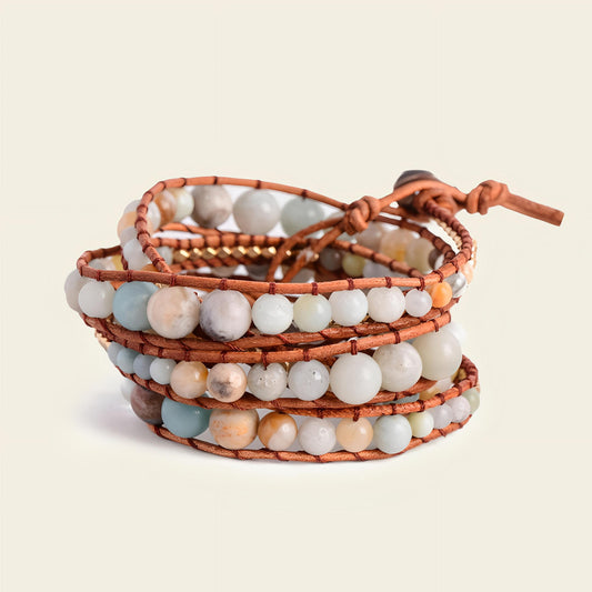 Paleshore Bead Bracelet with pale round beads on a layered brown cord wrap