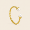 Pearl Arc Ring with an open twisted band with pearl ends in gold finish