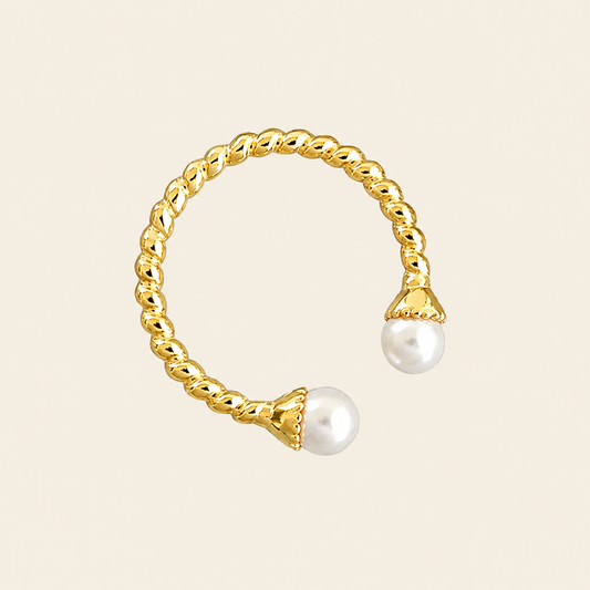 Pearl Arc Ring with an open twisted band with pearl ends in gold finish