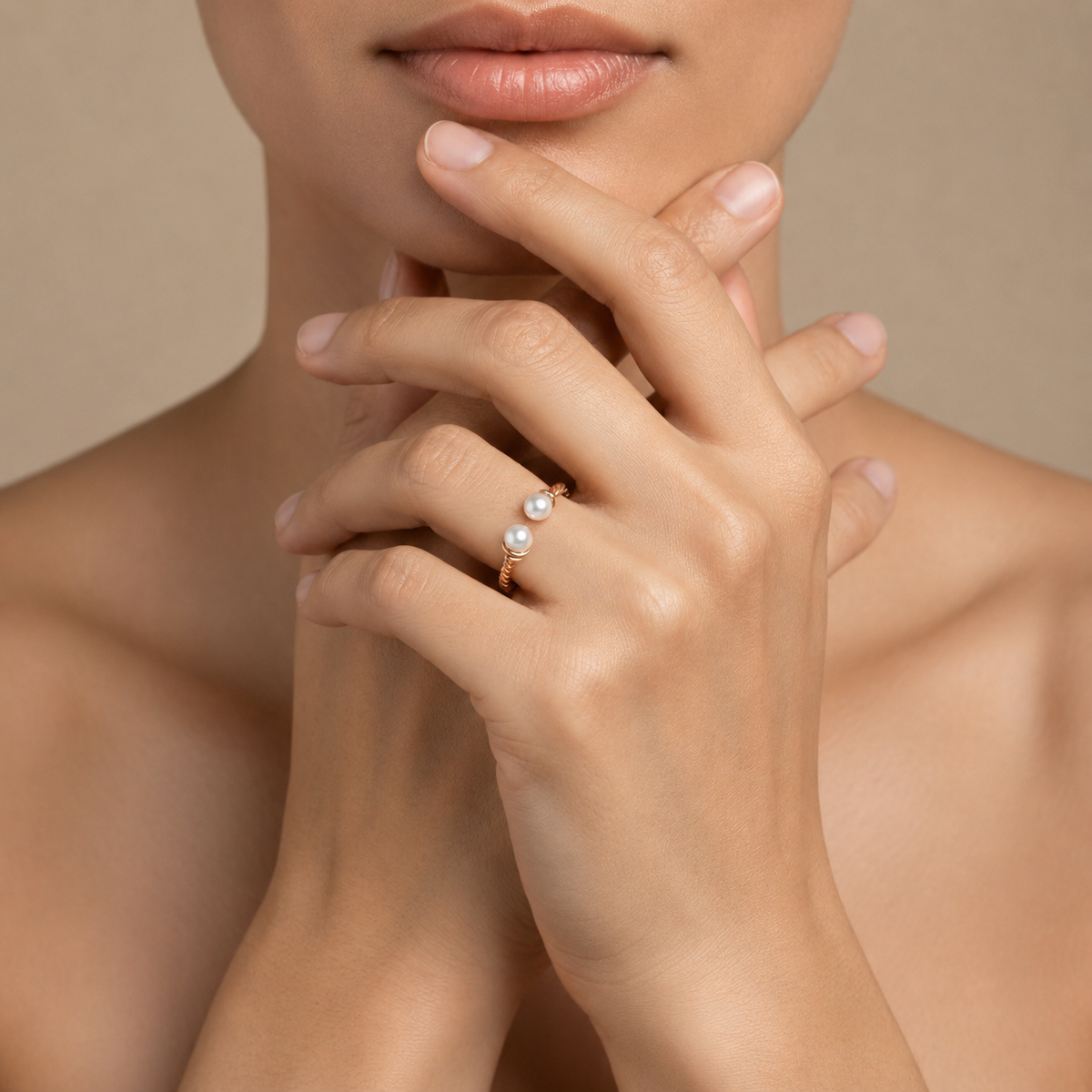 Pearl Arc Ring worn on the hand in gold finish