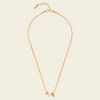 Pearl Embrace Necklace with a central pearl framed by curved metal details in gold finish