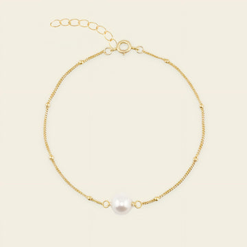 Pearl Line Bracelet with a fine chain with a central pearl detail in gold finish