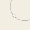 Pearl Line Bracelet with a fine chain with a central pearl detail in silver finish