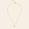 Pearl Trace Necklace with a fine chain and a single pearl drop in gold finish