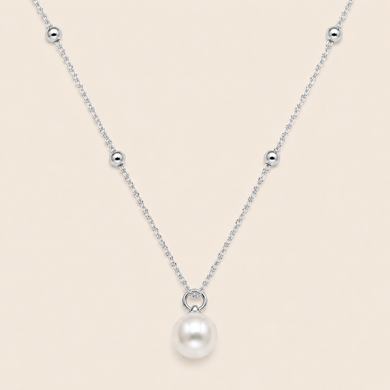 Pearl Trace Necklace with a fine chain and a single pearl drop in silver finish