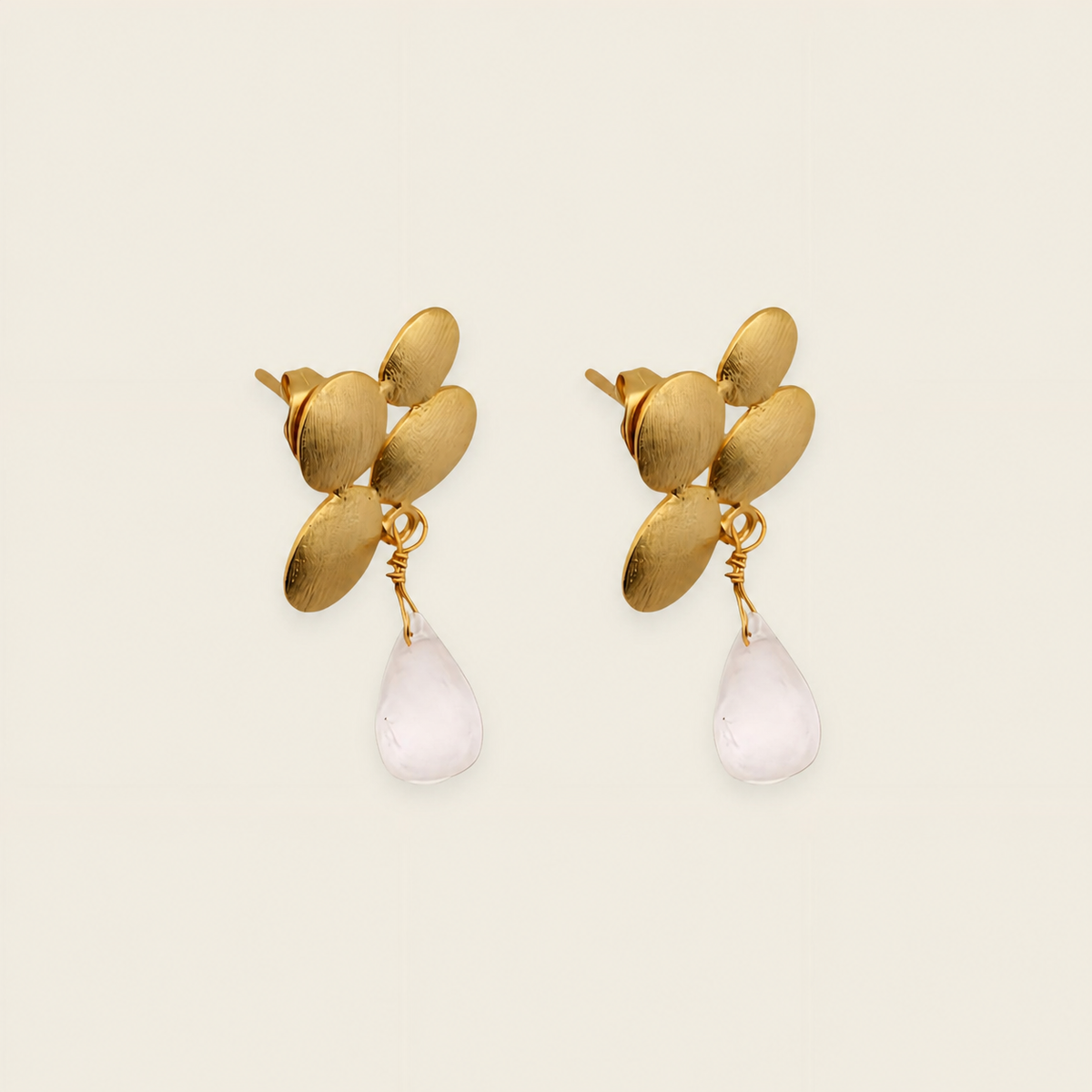 Petal Glow Earrings with gold-coloured flower tops and pale teardrop drops