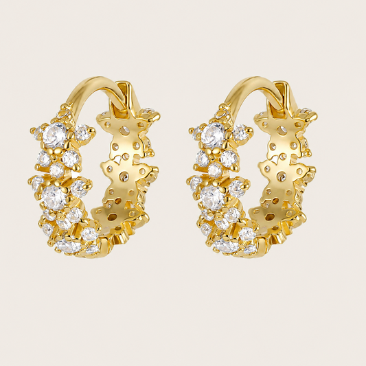 Petal Light Earrings with small hoops with flower-shaped clear stone details in gold finish
