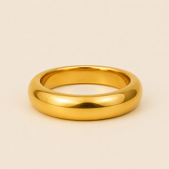 Polished Dome Cuff with a broad polished dome-shaped band in gold finish