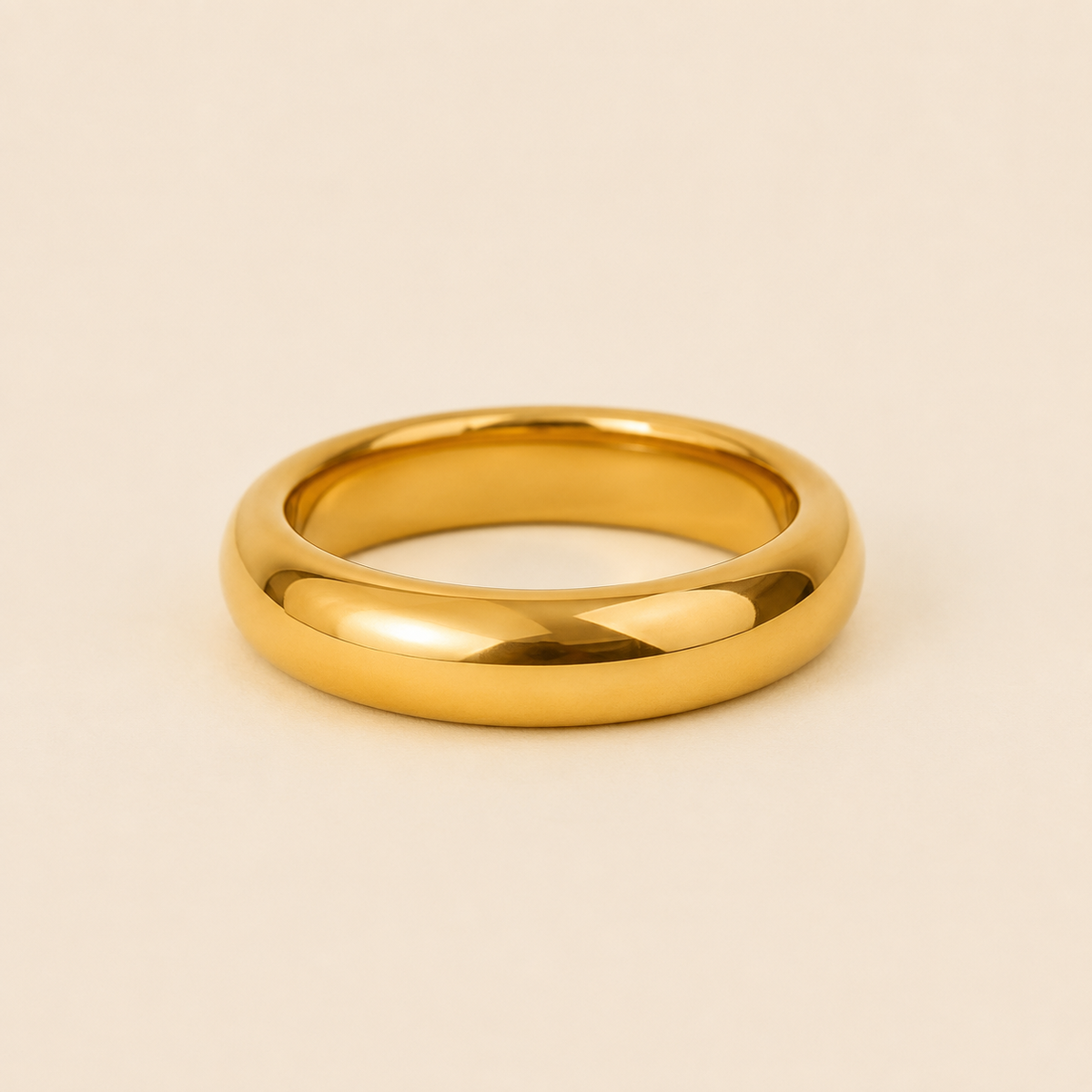 Polished Dome Cuff with a broad polished dome-shaped band in gold finish