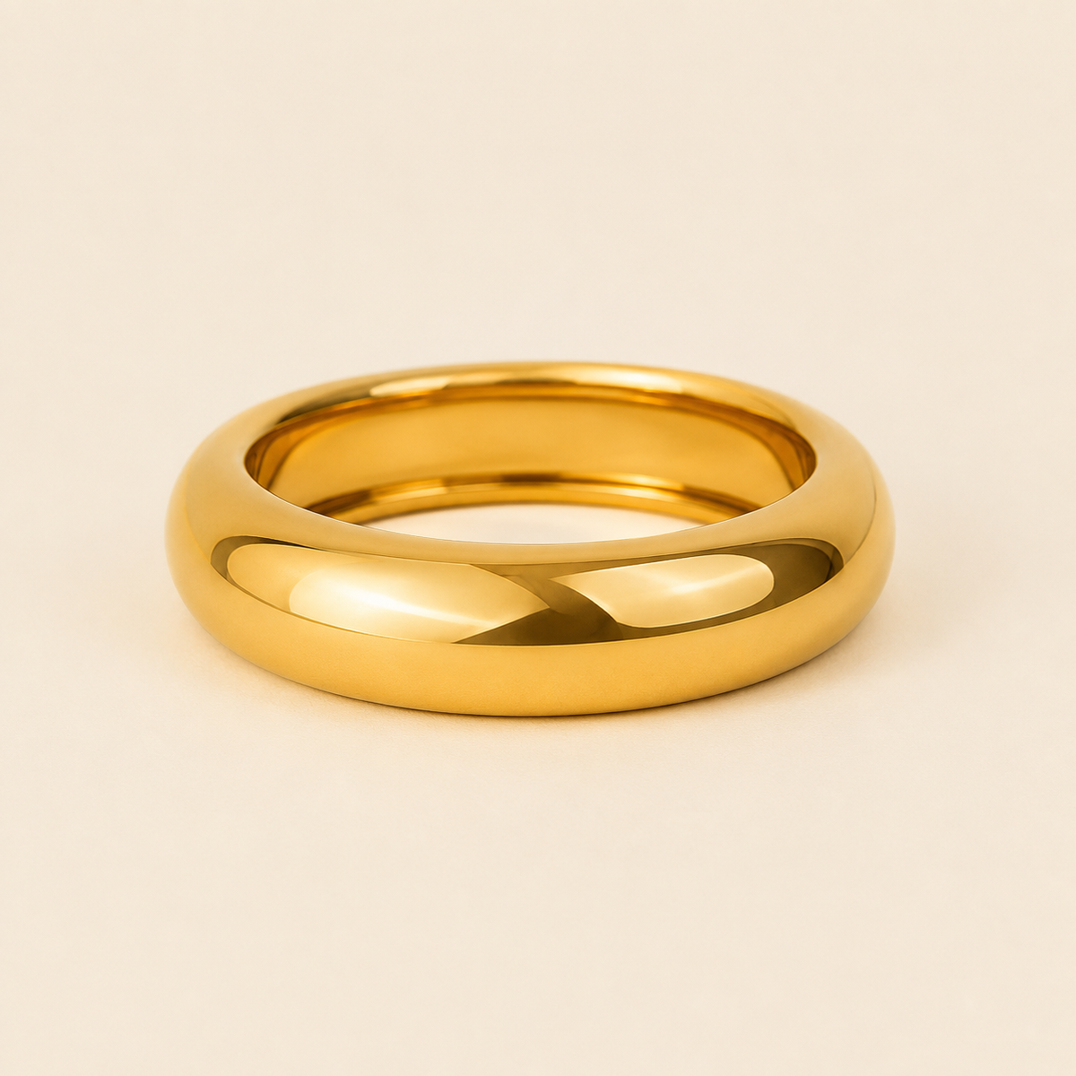 Polished Dome Cuff with a broad polished dome-shaped band in gold finish