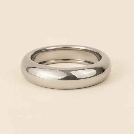 Polished Dome Cuff with a broad polished dome-shaped band in silver finish