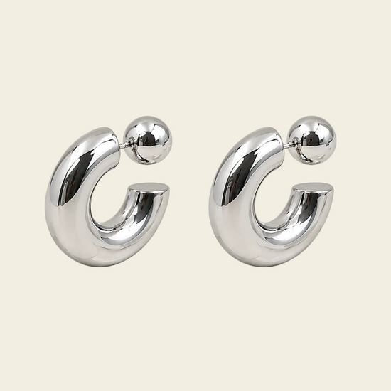 Polished Orbit Earrings with polished open circular shapes in silver finish
