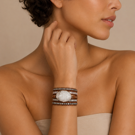 Quiet Clarity Bracelet worn on the wrist, with layered small beads on brown cord