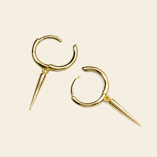 Quiet Edge Earrings with small hoops with pointed spike charms in gold finish