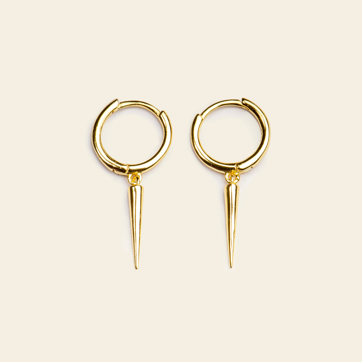 Quiet Edge Earrings with small hoops with pointed spike charms in gold finish