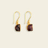 Quiet Flame Earrings with dark purple stone drops with gold-coloured edges