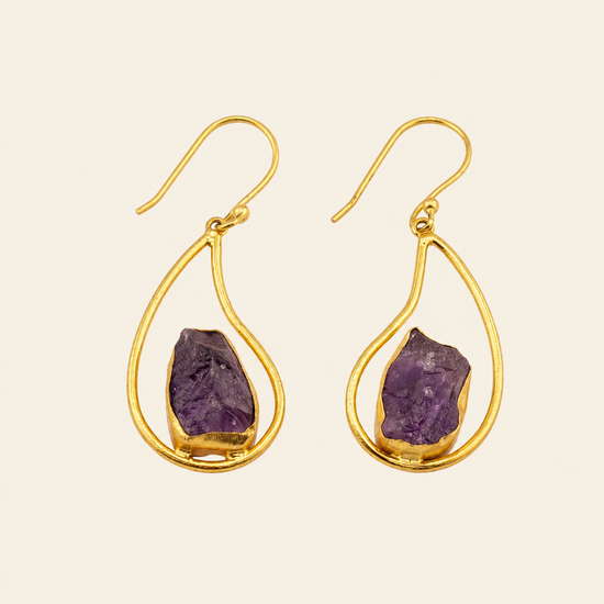 Quiet Halo Earrings with purple stone drops inside open teardrop frames