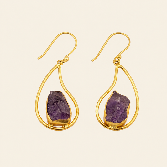 Quiet Halo Earrings with purple stone drops inside open teardrop frames