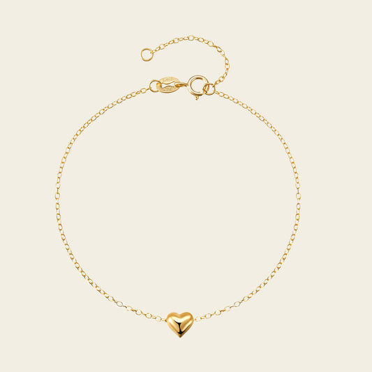 Quiet Heart Bracelet with a small heart charm on a fine chain in gold finish