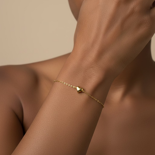 Quiet Heart Bracelet worn on the wrist in gold finish