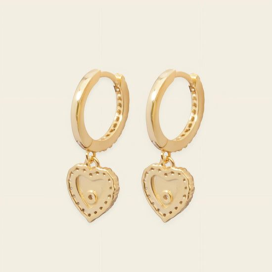 Quiet Heart Earrings with heart-shaped charms on small hoops in gold finish