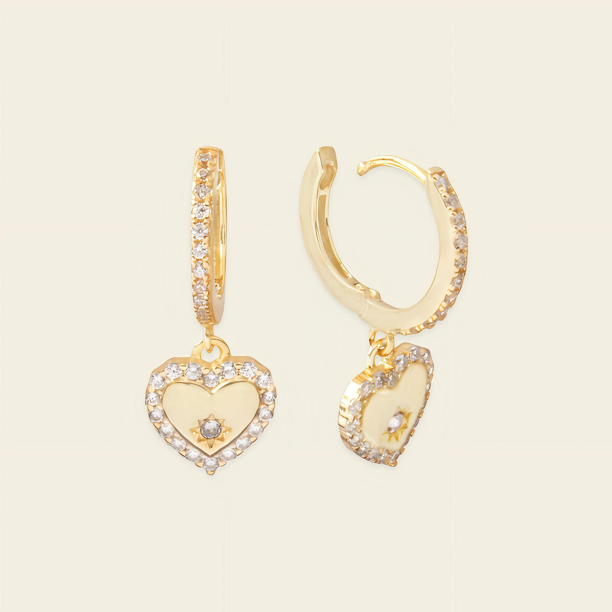 Quiet Heart Earrings with heart-shaped charms on small hoops in gold finish