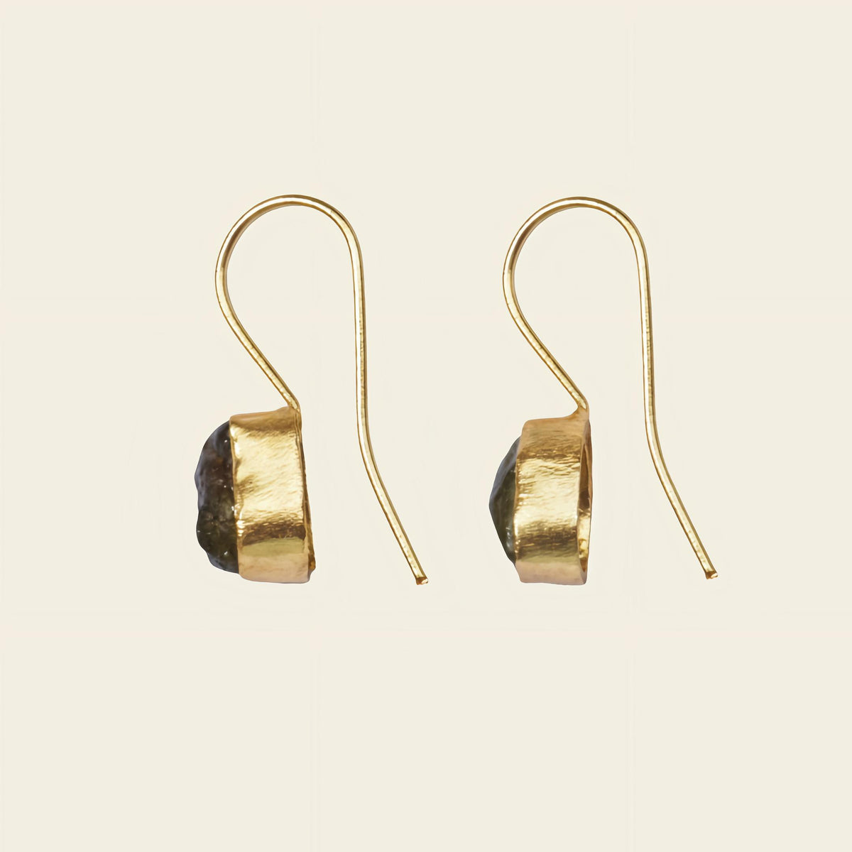 Quiet Leaf Earrings with green stone drops on gold-coloured hooks