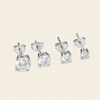 Quiet Light Earrings with clear cushion-shaped stud settings in silver finish