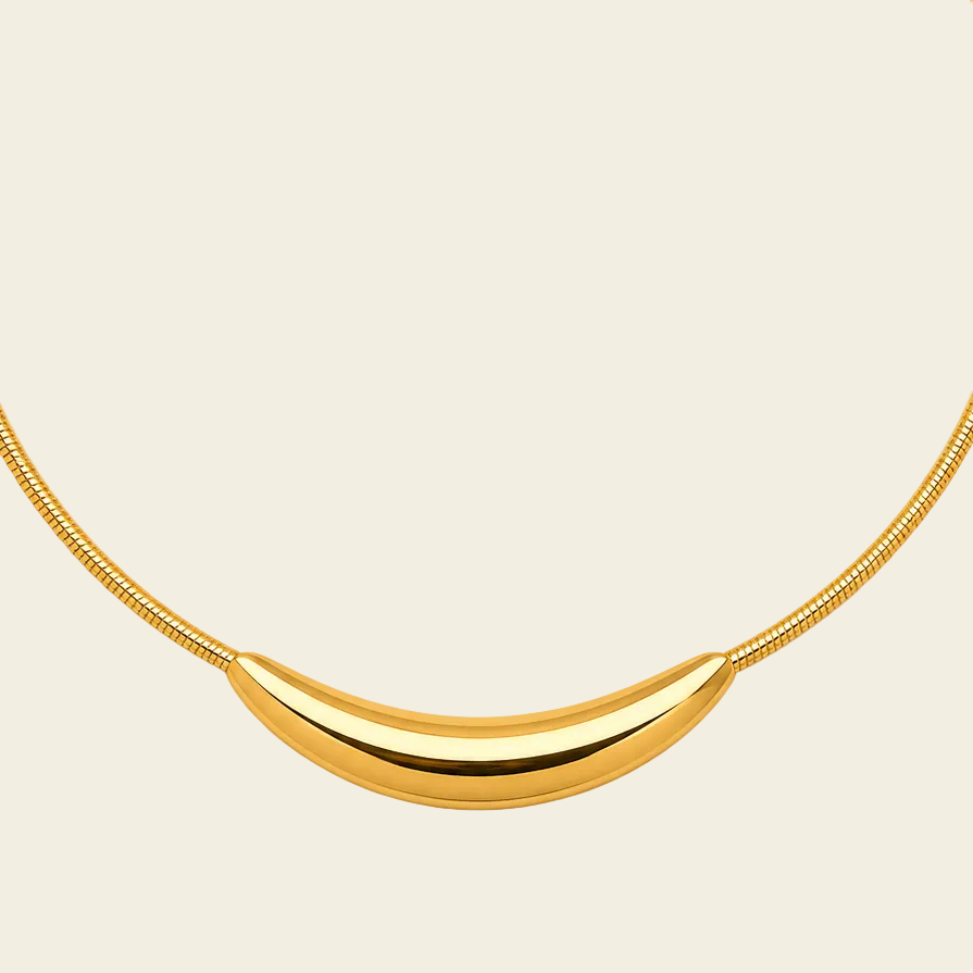 Sculpted Arc Necklace with a fine collar with a sculpted curved centre in gold finish