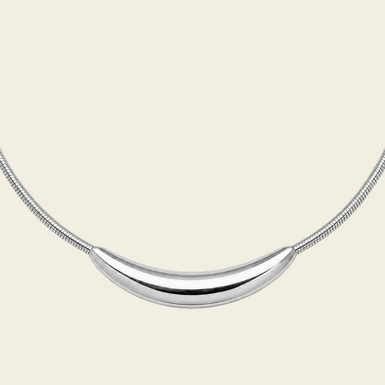 Sculpted Arc Necklace with a fine collar with a sculpted curved centre in silver finish