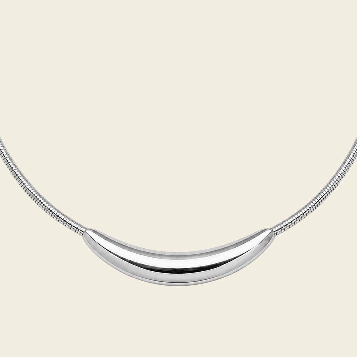 Sculpted Arc Necklace with a fine collar with a sculpted curved centre in silver finish