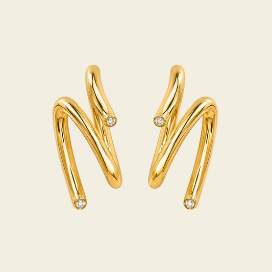 Sculpted Wave Earrings with asymmetric sculptural wave shapes in gold finish