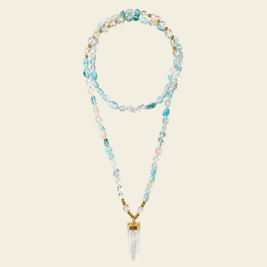 Sea Mist Necklace with pale blue beads and a clear pointed pendant