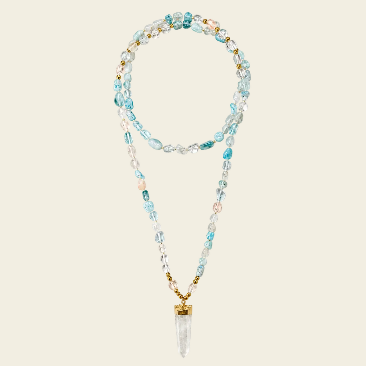 Sea Mist Necklace with pale blue beads and a clear pointed pendant