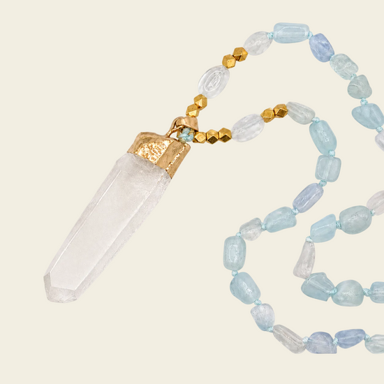Sea Mist Necklace with pale blue beads and a clear pointed pendant