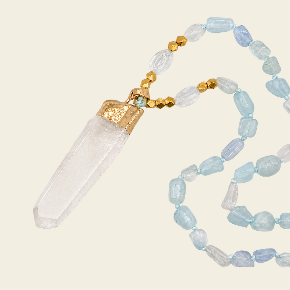Sea Mist Necklace with pale blue beads and a clear pointed pendant