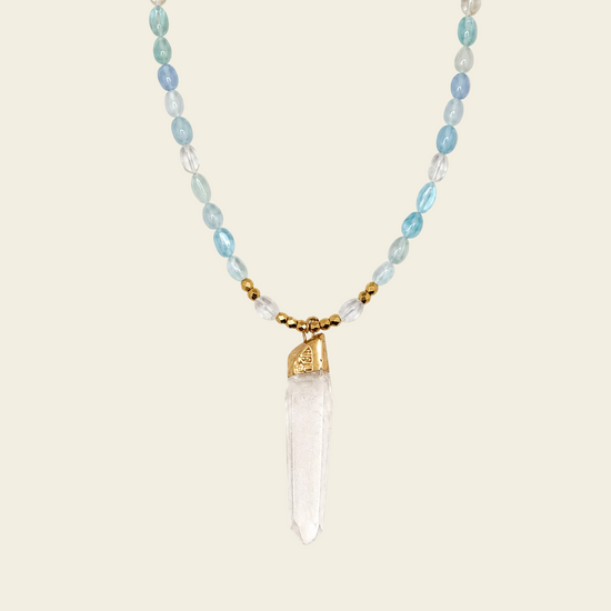 Sea Mist Necklace with pale blue beads and a clear pointed pendant