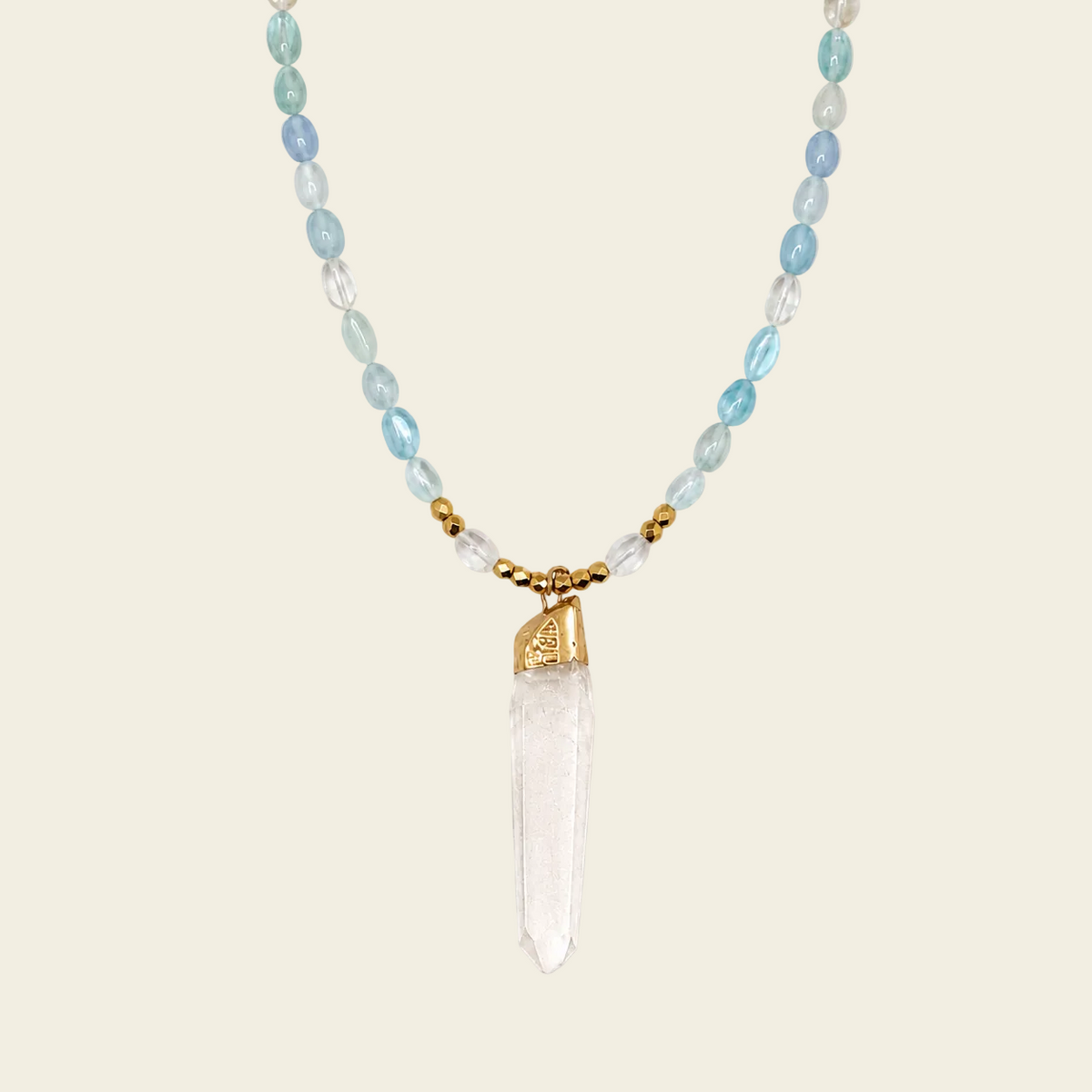 Sea Mist Necklace with pale blue beads and a clear pointed pendant