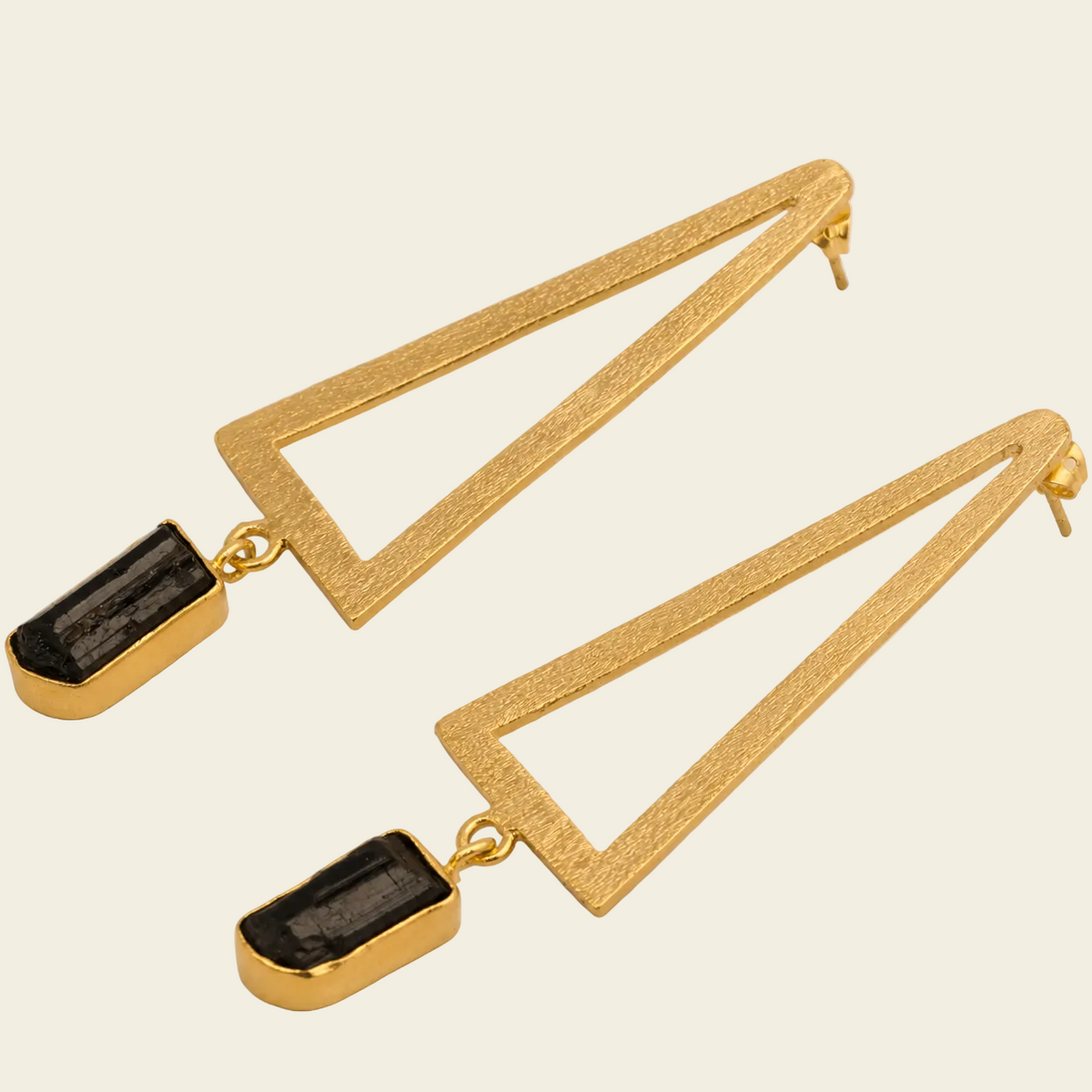 Shadow Frame Earrings with long triangular frames and dark rectangular drops