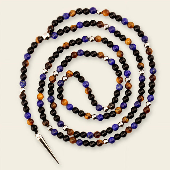 Shadow Point Necklace with small stone beads and a slim pointed pendant