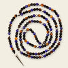 Shadow Point Necklace with small stone beads and a slim pointed pendant