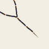 Shadow Point Necklace with small stone beads and a slim pointed pendant