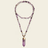 Signal Drift Necklace with purple beads and a pointed purple pendant