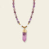 Signal Drift Necklace with purple beads and a pointed purple pendant