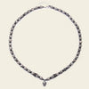 Skull Drift Necklace with round stone beads and skull-shaped accents