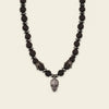 Skull Drift Necklace with round stone beads and skull-shaped accents